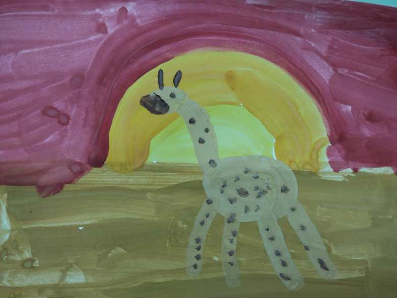 Жираф на закате солнца 