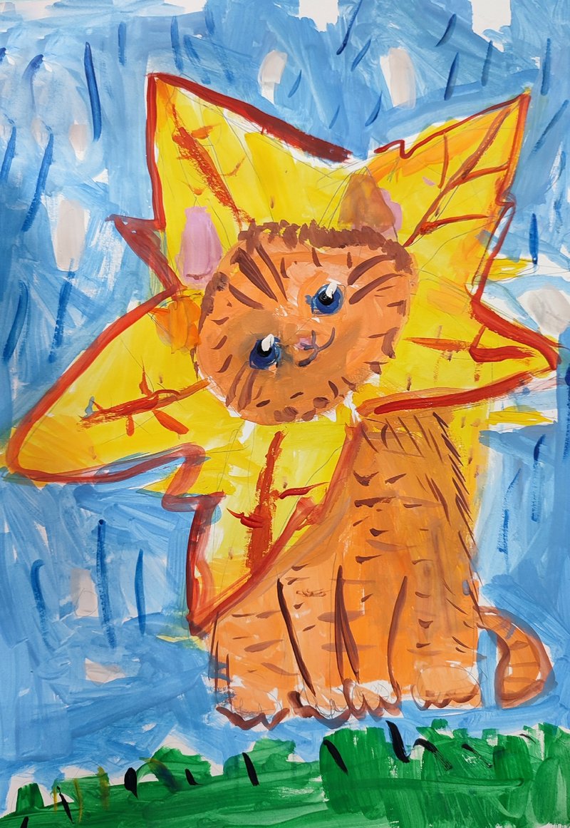 Котик с осенним листом